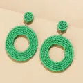 Handgemaakte geweven groene kraal boho vintage cirkel oorbellen, mode sieraden details. - Groen