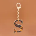 Leopard muster Acetat S Buchstabe Schlüsselanhänger mit goldfarbenem Metall Ring Damen. - Buchstabe S