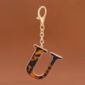 Schildpatt Buchstabe U Schlüsselanhänger goldene Kette süßer Taschenanhänger Accessoire - Buchstabe U