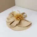 Exquisite handmade straw fascinator hat with elegant floral and feather details for weddings. - Champagne