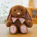 Cute brown plush bunny toy with floral ears and bow, soft stuffed animal for home decor and gift. - Brown / 30 cm (Soft and Comfortable)