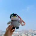 Cute plush penguin keychain bag pendant with knitted hat and pink strap for daily decor. - Pink Straw Hat Penguin