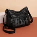 Elegante borsa a tracolla nera in pelle per donna, pratica crossbody con tasche e cerniere. - Nero