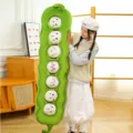 Süßes grünes Erbsenschote Plüschkissen mit mehreren niedlichen Puppengesichtern, weiches Kuscheltier. - 160cm (7 Stück)