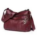 Wine red soft leather multi-pocket crossbody bag for women, spacious daily shoulder bag variant. - Red