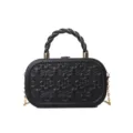 Black embossed box handbag with braided top handle and gold chain strap for women. - Black