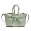 Light green patent leather handbag with top handles and stylish front buckle detail. - Green