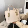 Chic cream white structured shoulder bag with metal decor, trendy women cross body biscuit bag. - White