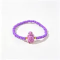 Bracelet en perles violettes fait main avec un charmant pendentif tortue rose et or - Tortue Violette