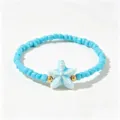 Bracelet bohème fait main en perles bleues avec un joli pendentif en étoile de mer - Étoile de Mer Bleu Ciel