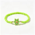 Bracelet fait main en perles vert clair de style bohème avec une fleur en céramique - Fleur Vert Vif