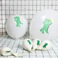 White latex balloons featuring green dinosaur print for kids birthday party decoration - 100 Dinosaur Balloons
