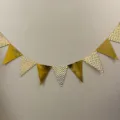 Gold chevron triangular bunting banner for party decoration, hanging garland detail shot. - Bronzed Wavy Pattern Bunting