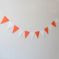 Orange and white triangle banner bunting for party decoration, festive hanging flag decor. - Orange & White Pennant Banner