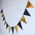 Black and gold triangle banner for birthday party decoration, festival hanging bunting. - Black and Gold Triangle Bunting