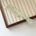 Green acetate hair comb with marble texture, elegant portable anti-static styling tool. - Thickness Style / Green