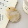Detailed close-up shot of the elegant retro portable acetate hair comb showing fine texture. - Approx 7.8cm*5.7cm / 1# Magic Yellow