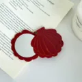 Red acetate shell pocket makeup mirror, cute portable folding cosmetic mirror detail shot. - Style 8
