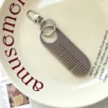 Mini kam sleutelhanger draagbaar haar styling sleutelhanger schattig tas make-up kam - 9cmx3.2cm / Grijs