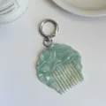Portable acetate shell comb keychain stylish pearlescent marble bag pendant for women. - Approx. 6.4cm*6.4cm / Blue
