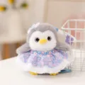 Cute penguin plush toy wearing a cute blue floral dress and lace bonnet, soft plush desktop decor. - Sister in Blue Dress
