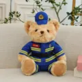 Cute police teddy bear plush toy wearing a blue uniform and hat, soft stuffed animal gift. - Blue Firefighter Rescue Bear / 25cm