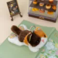 Cute calico cat plush toy keychain with floral ears, soft animal doll desk companion gift. - Calico Cat