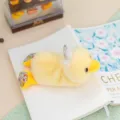 Cute yellow plush duck keychain with floral print, soft stuffed animal toy pendant for bags. - Chicken