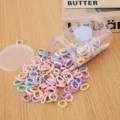 Kleurrijke naadloze mini haarrekkers voor kinderen, snoepkleur haarelastiekjes in heldere bewaardoos. - 200 Stuks (Diameter ca. 2cm) / Noordse Kleur