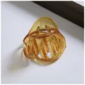 Amber resin hair claw clip detail, translucent medium shark clip for half up bun styling. - Irregular Shaped Hair Clips / Brown