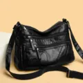 Borsa a tracolla in pelle morbida nera con tasche multiple, elegante borsa casual da donna. - Nero