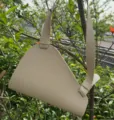 Beige leather bouquet gift bag, minimalist triangle floral packaging tote for artistic dried flowers. - Off White
