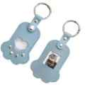 Cute blue paw shape leather keychain for pet photo and hair memorial keepsake pendant. - Light Blue