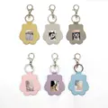 Cute paw-shaped pet hair memorial keychain and photo holder in six vibrant color options. - Yellow