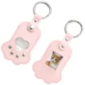 Cute pink paw shaped pet photo and hair keepsake leather keychain detail close up view - Pink