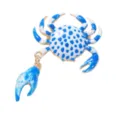 Close-up of the blue and white enamel crab brooch detail, alloy texture and cute dangling claw. - Sky Blue