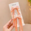Cute children mesh bow hair clips with long streamers, bright orange color, perfect detail. - Orange Long Ribbon Hair Clips - Pack of 2