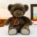 Cute brown teddy bear plush toy with a stylish knitted bowtie, soft and cuddly gift for kids. - Deep Coffee Brown