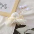 Fluffy plush hair claw clip with elegant ribbon bow and cute pearl tassel charms for women. - Tassel Bow Plush Hair Claw / Off White