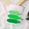 Détail de pinces à cheveux en métal vert forme pelle, accessoires style Y2k pinces bec de canard. - Lot de 3 barrettes pelles vertes