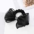 Chouchou de cheveux en résille noire avec grand nœud et strass, accessoire élégant. - Élastiques Cheveux Nœud Strass / Noir