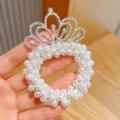 Pearl crown hair tie detail close up, sparkling rhinestones, cute kids hair accessory. - Princess Crown Hair Tie #1