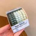 Matte verlooptelefoonsnoer haarelastiekjes, flexibele spiraalvormige haarbanden detail. - Ijsregen
