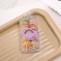 Colorful elastic hair ties for kids in a clear storage box with cute rainbow packaging. - Pineapple Hair Ties (Box of 60)