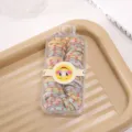 Kids cute colorful hair rubber bands set with strawberry print in clear storage box for girls. - Alphabet Strawberry Hair Ties - 60 Pieces per Box