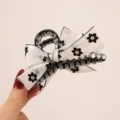 Elegant black and white floral bow hair claw clip with sparkling rhinestones for women. - Floral Double-Sided Bowknot