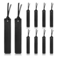 Close-up detail of black leather bookmark with stitched edges and tassel ribbon set display. - Black