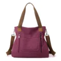 Women's purple canvas tote bag, casual shoulder bag with dual handles and crossbody strap. - Purple