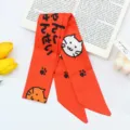 Orange ribbon hair scarf with cute cat print and Japanese text. Soft silk feel hair accessory. - Orange Kitten Satin Scarf