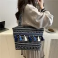 Ethnic style canvas tote bag with tassels, large capacity casual shoulder bag for women. - Black